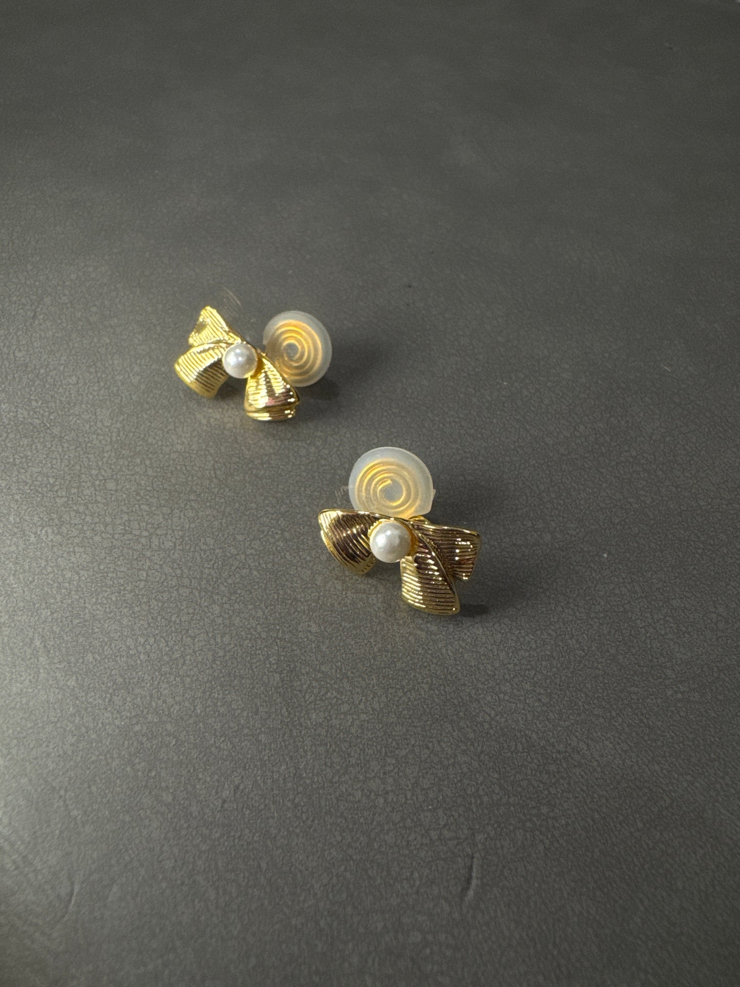 Golden Metal Textured Bow Pearlised Clip On Earrings