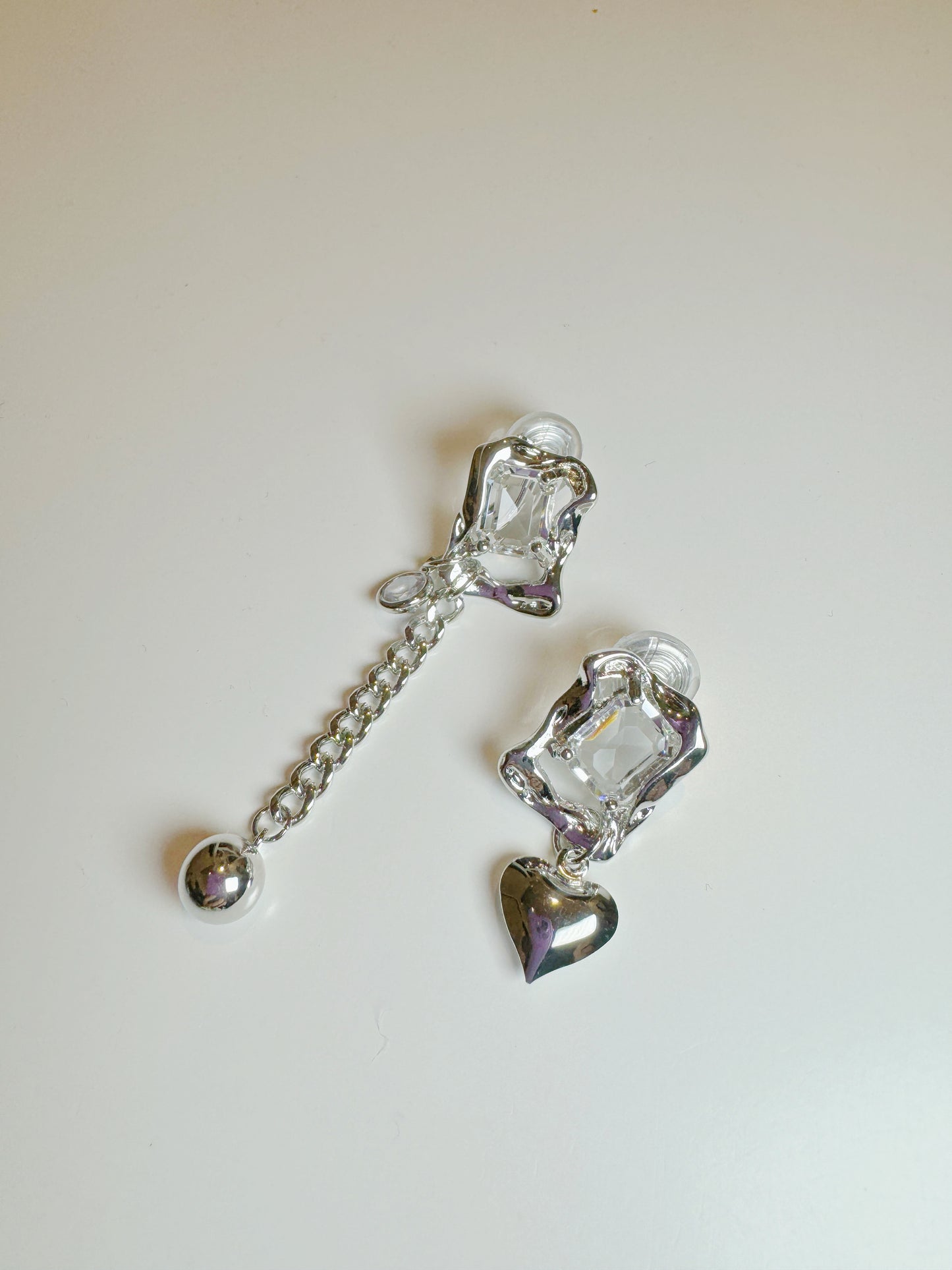 Silver Zircon with Heart and Chain Mismatch Clip On Earrings. silver-tone clip-on earrings for women.