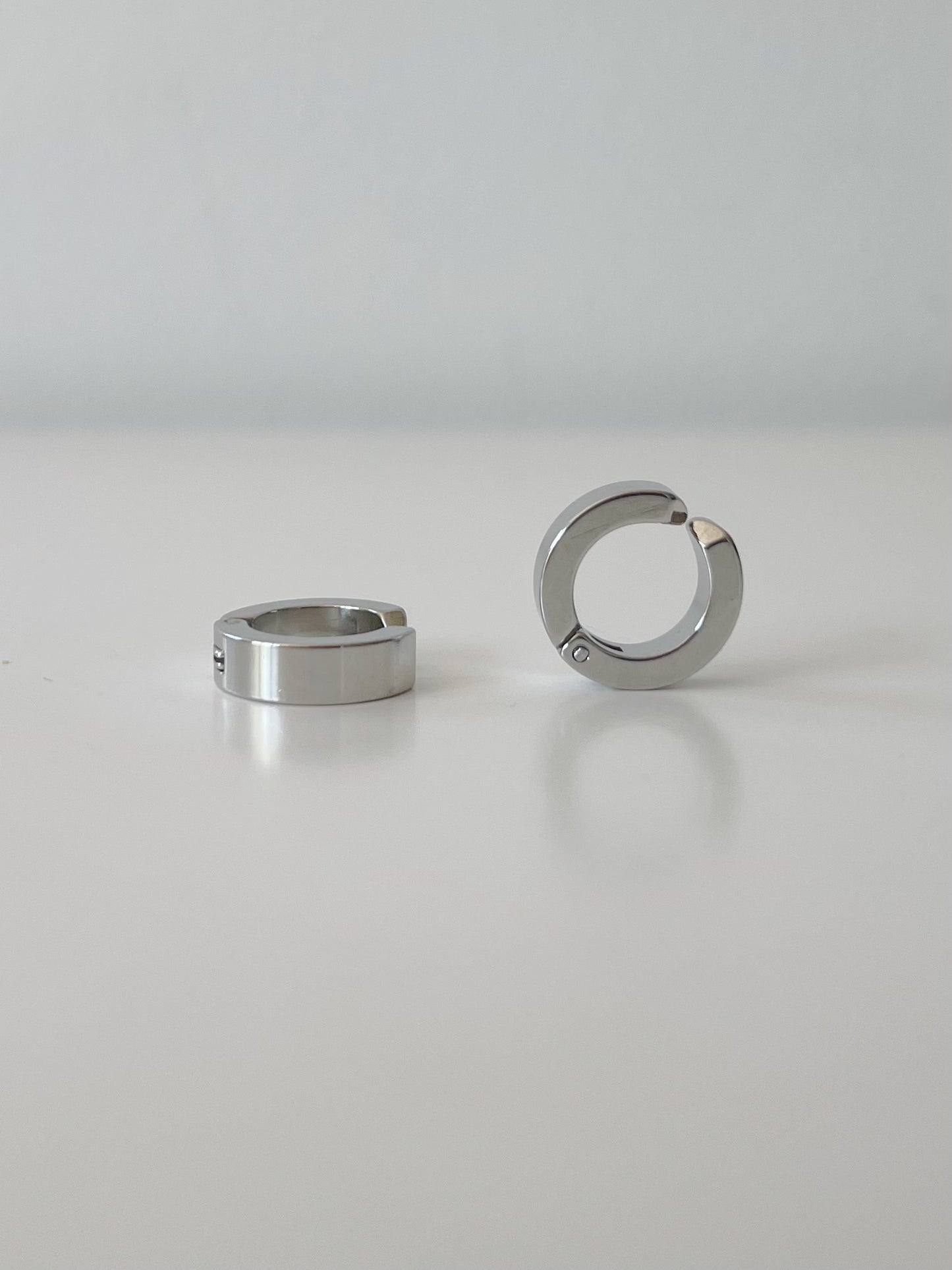 Men's Stainless Steel Hoop Clip On Earrings Silver. silver-tone clip-on earrings for women.