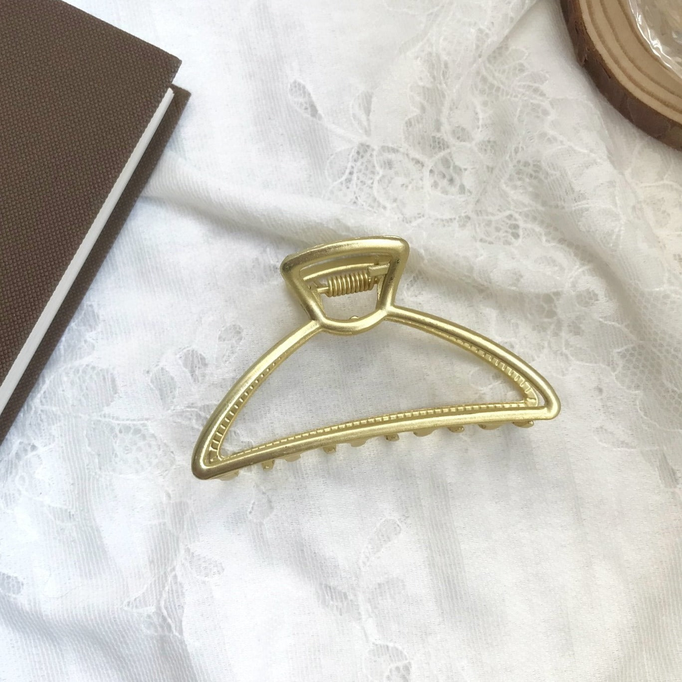 Gold Metal Hairclips Claw Clips Curve Medium. gold-tone clip-on earrings for women.