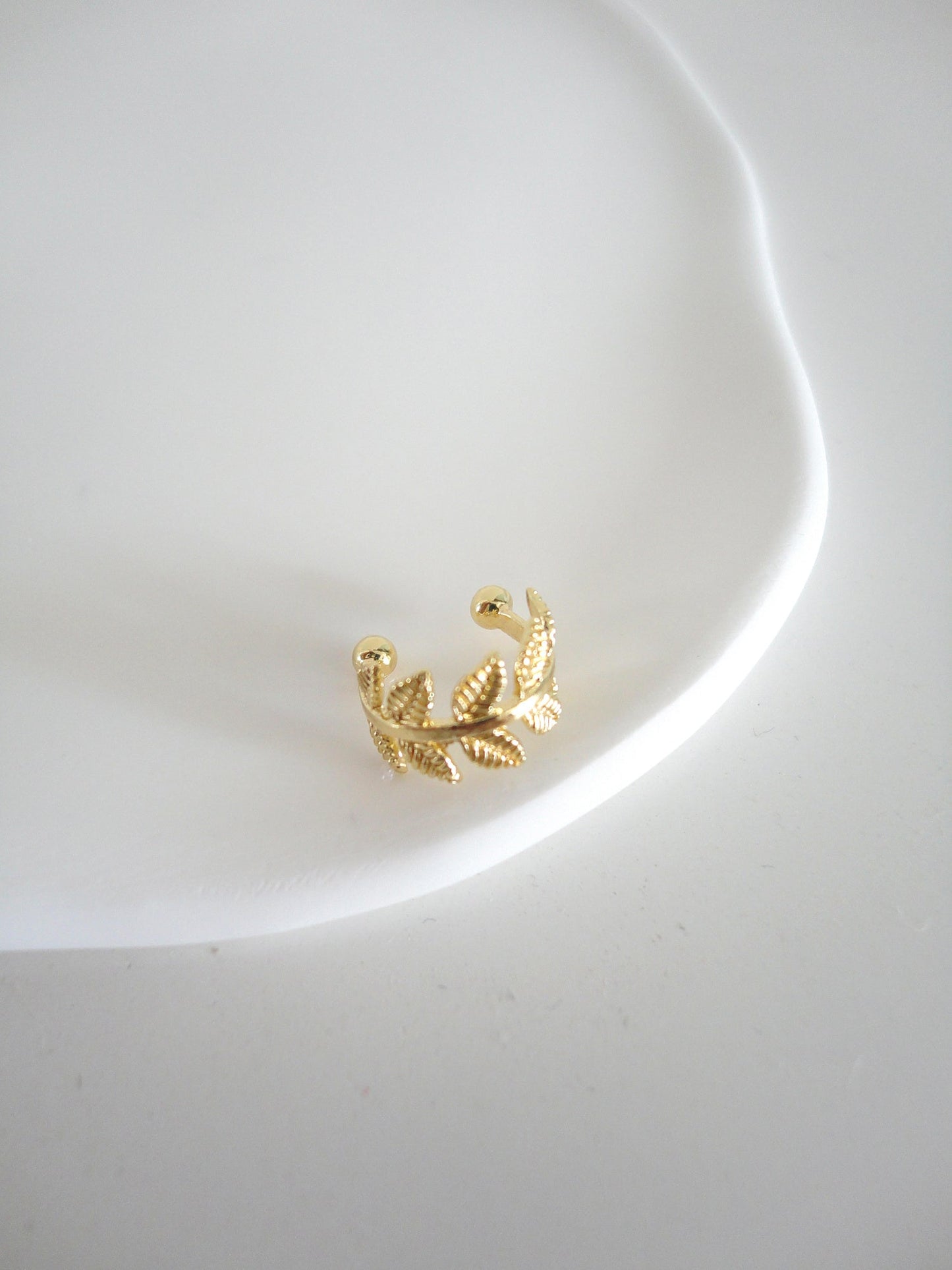 Golden Leaves Ear Cuff. gold-tone clip-on earrings for women.