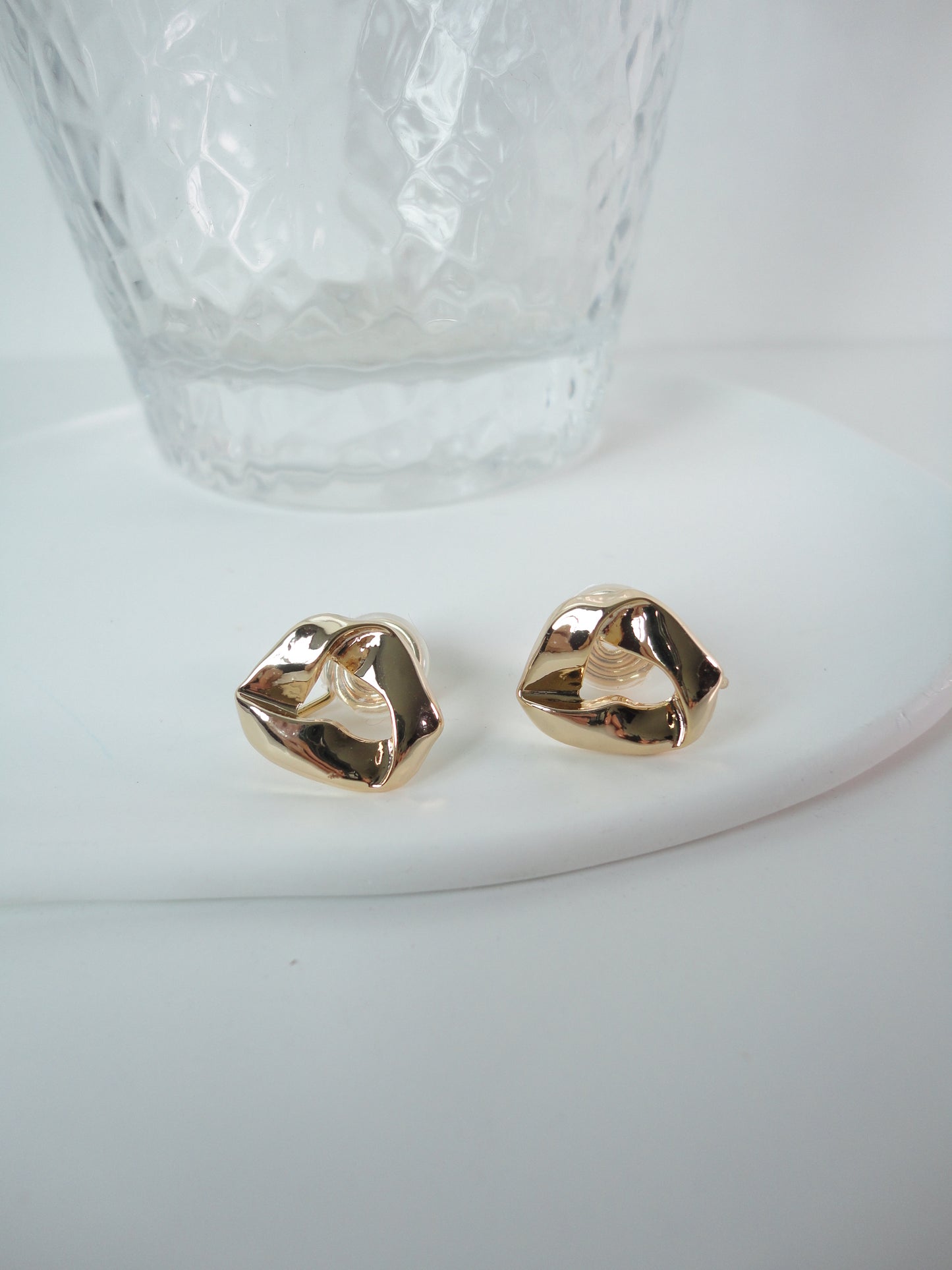 Golden Twist Open Triangle Clip On Earrings. gold-tone clip-on earrings for women.
