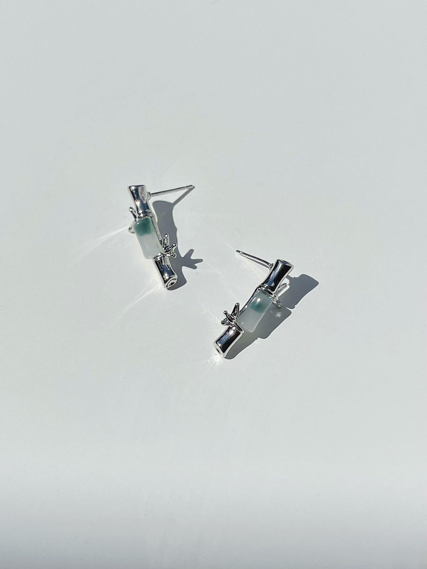 Silver Bamboo Shaped Stud Earrings. silver-tone clip-on earrings for women.