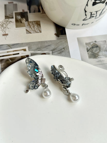 Blue Crystal Half Butterfly Pearlised Clip On Earrings