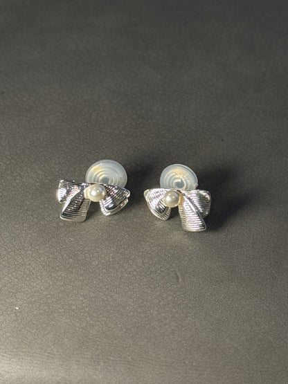 Silver Metal Textured Bow Pearlised Clip On Earrings