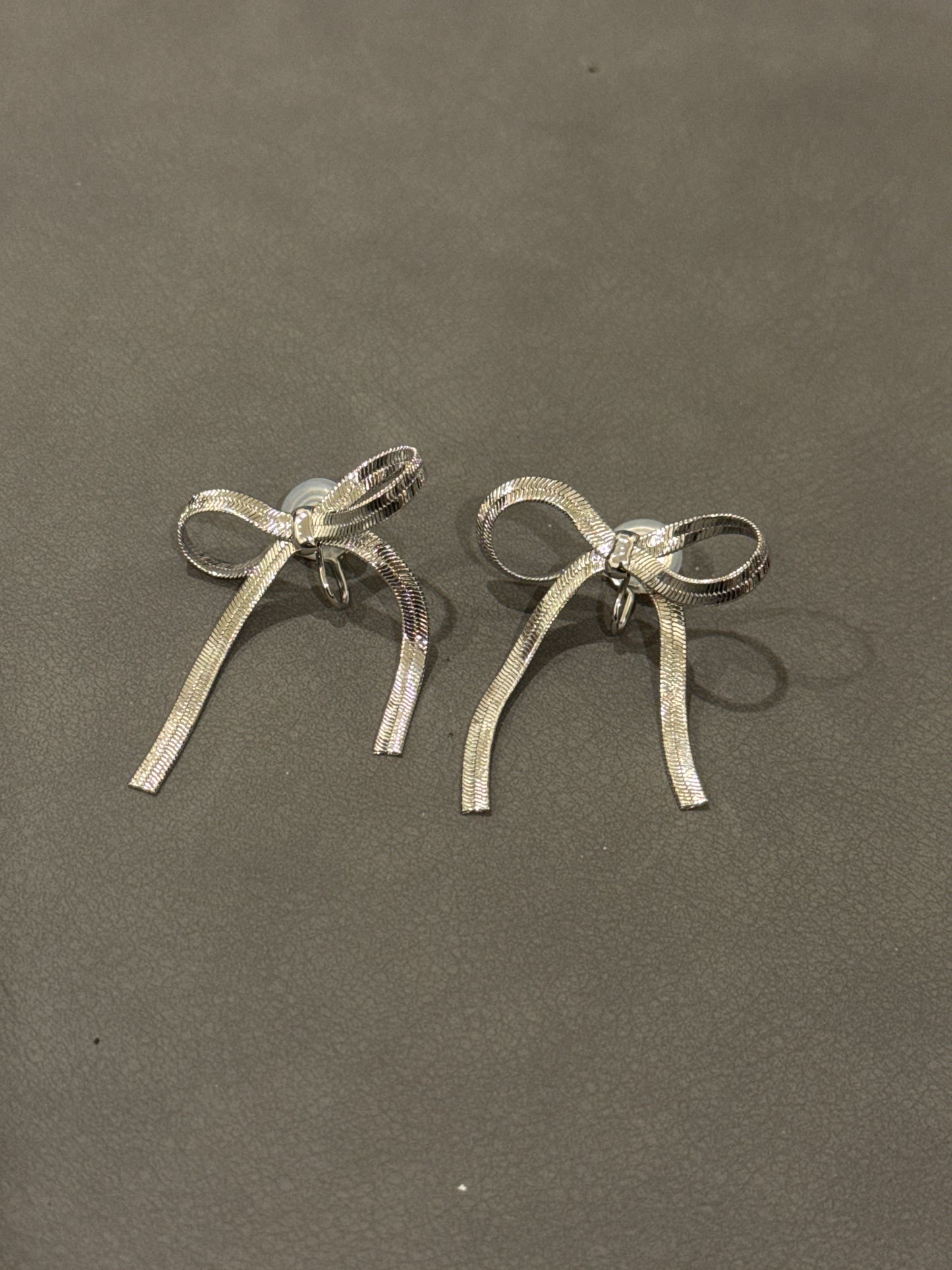 Silver Metal Bow Clip On Earrings