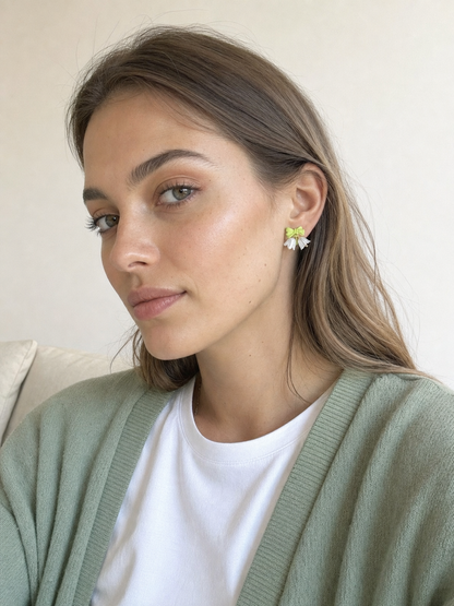 AI-generated try-on image - Green Bow White Flowers Clip On Earrings
