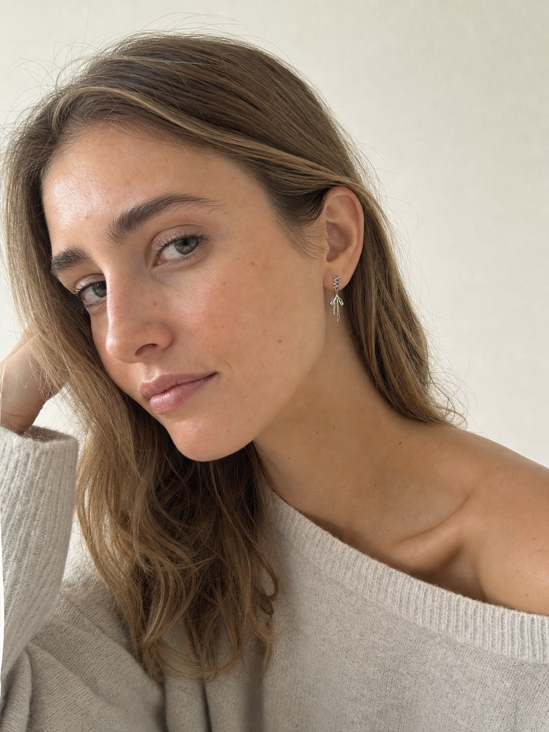AI-generated try-on image - Silver Ballet Ribbon Clip on Earrings