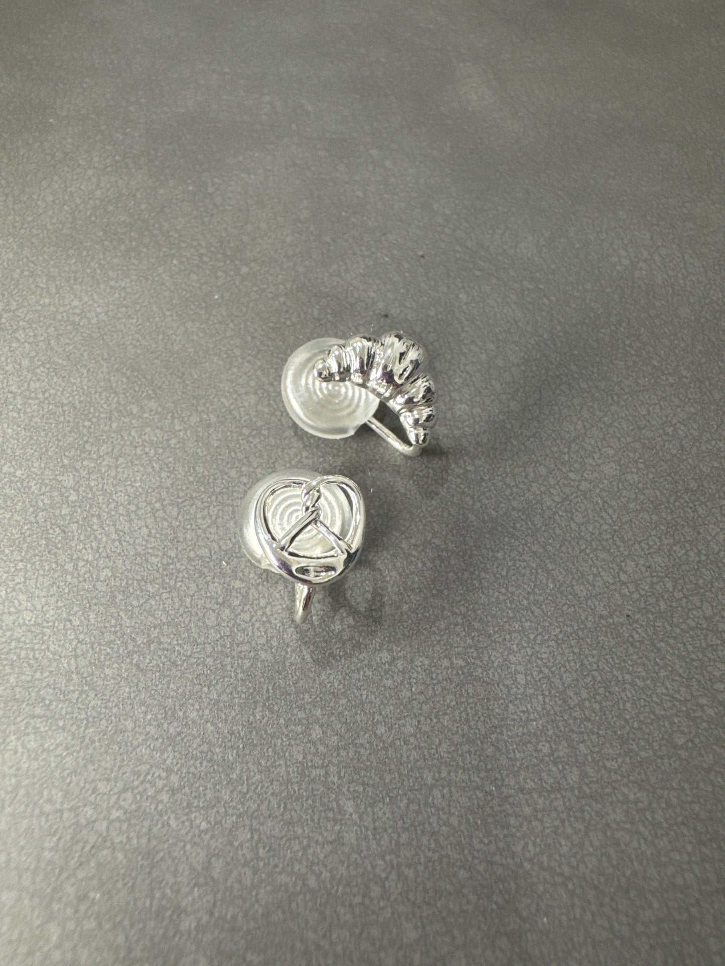 Silver Metal Small Croissant and Pretzel Mismatch Clip On Earrings