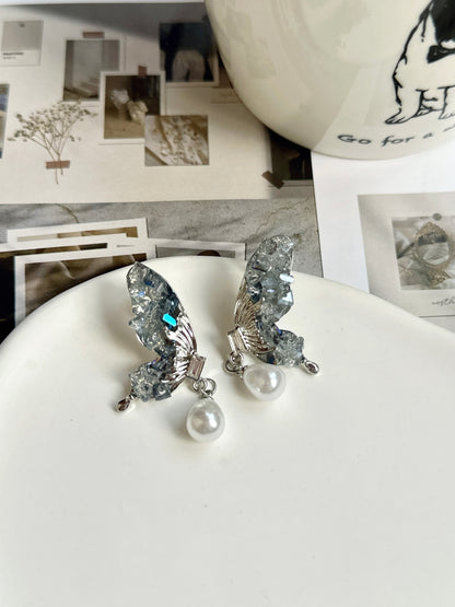 Blue Crystal Half Butterfly Pearlised Clip On Earrings