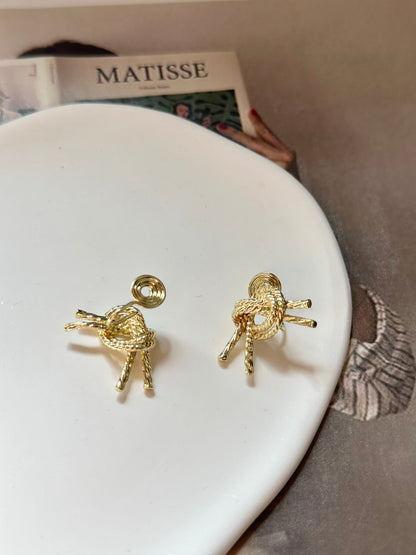 Golden Metal Knot Clip On Earrings