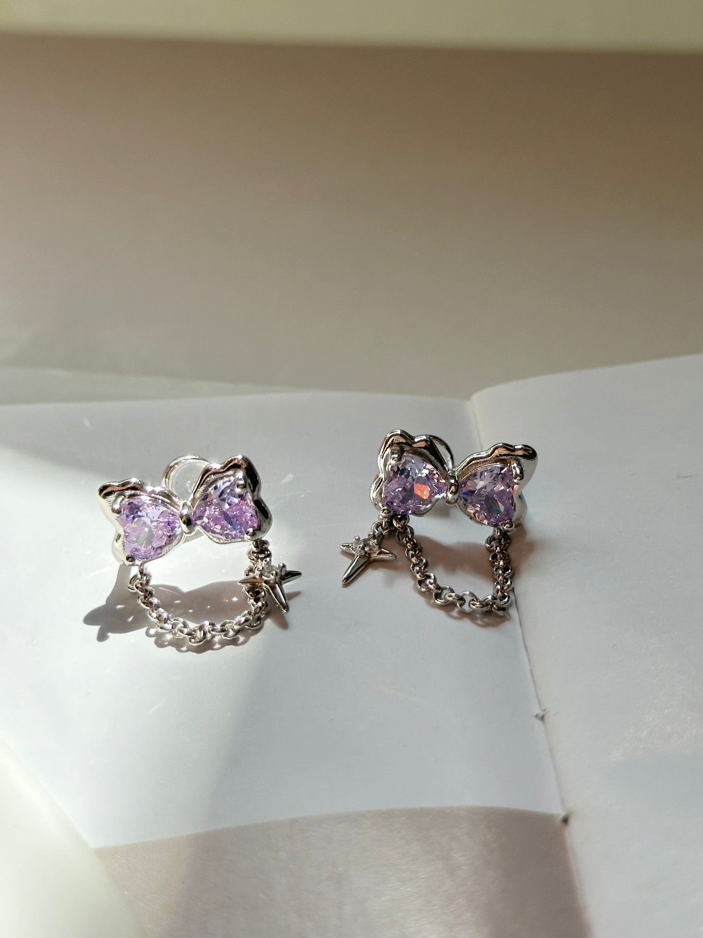 Purple Zircon Bow with Chain Clip On Earrings