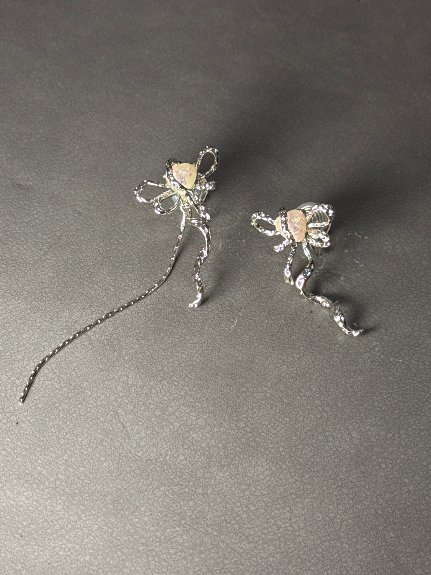 Silver Metal Bow Mismatch Clip On Earrings