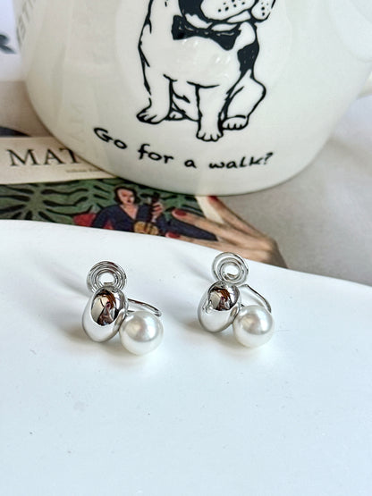 Silver Oval Pearlied Clip On Earrings. pearl, silver-tone clip-on earrings for women.