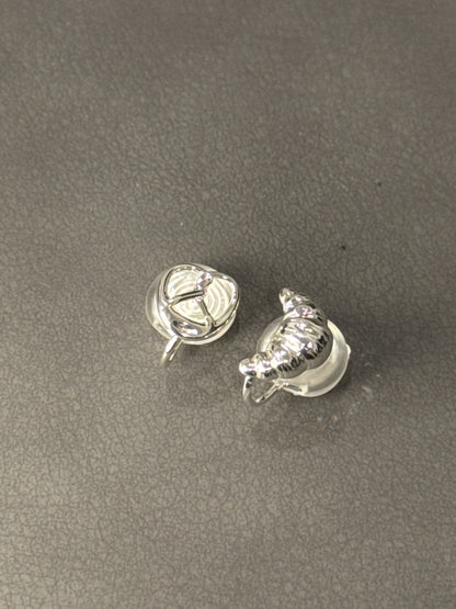 Silver Metal Small Croissant and Pretzel Mismatch Clip On Earrings