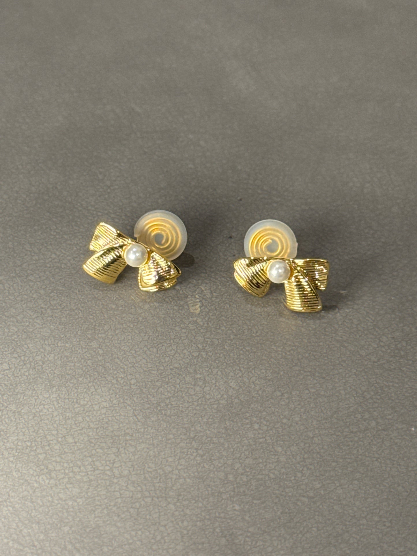Golden Metal Textured Bow Pearlised Clip On Earrings