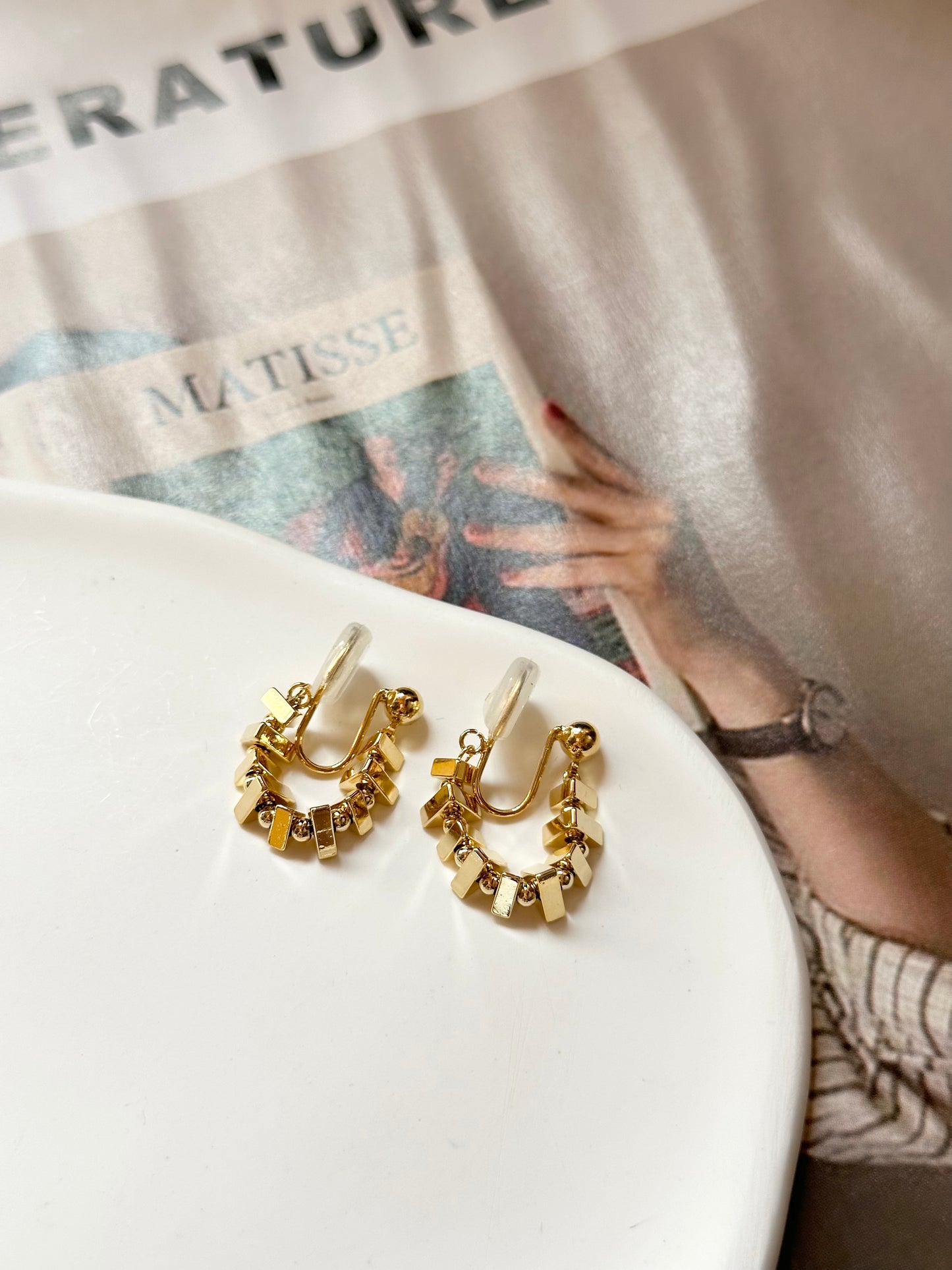 Golden Metal Chain Clip On Earrings. gold-tone clip-on earrings for women.