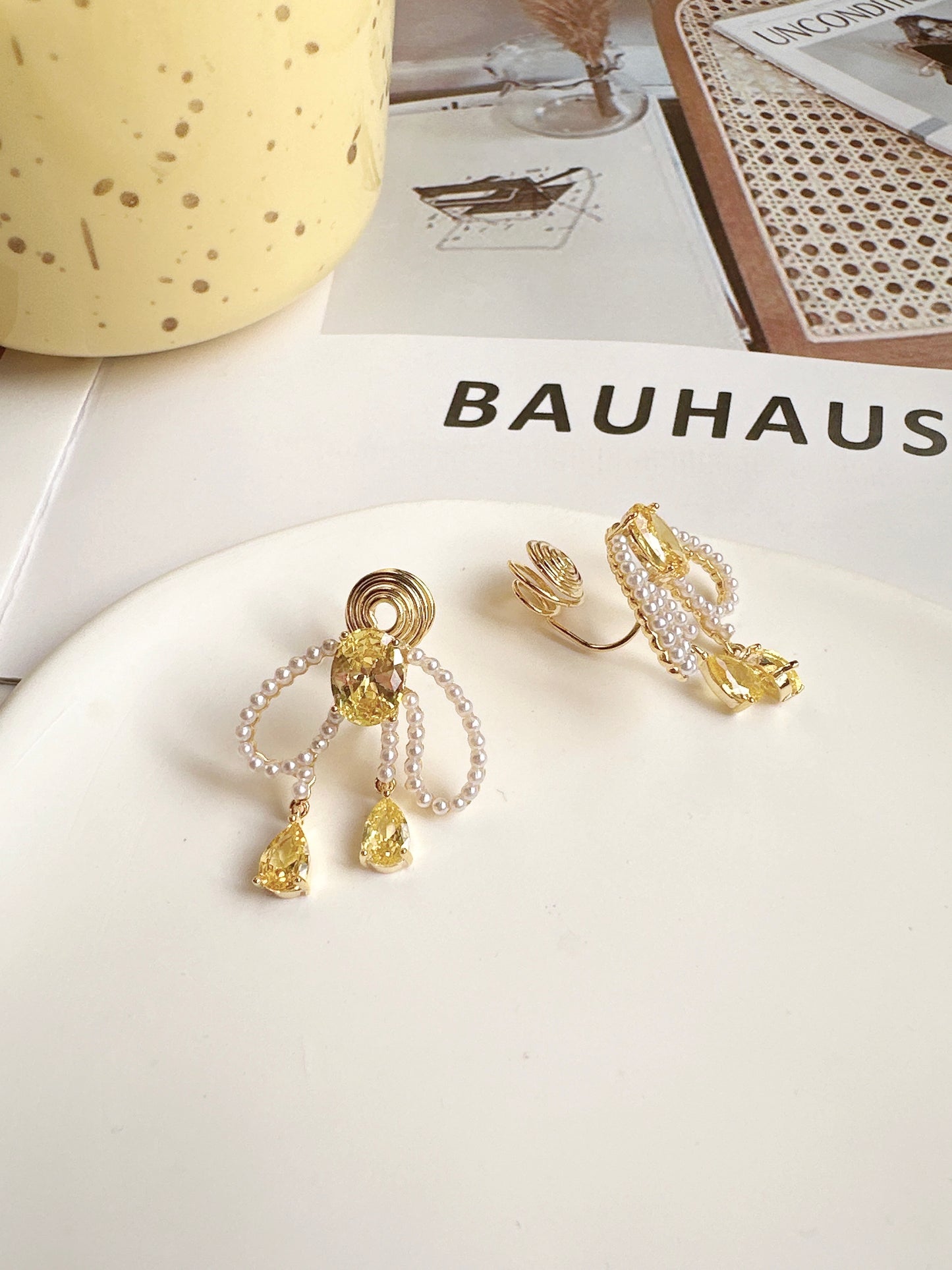 Pearlised Bow with Yellow Zircon Clip On Earrings