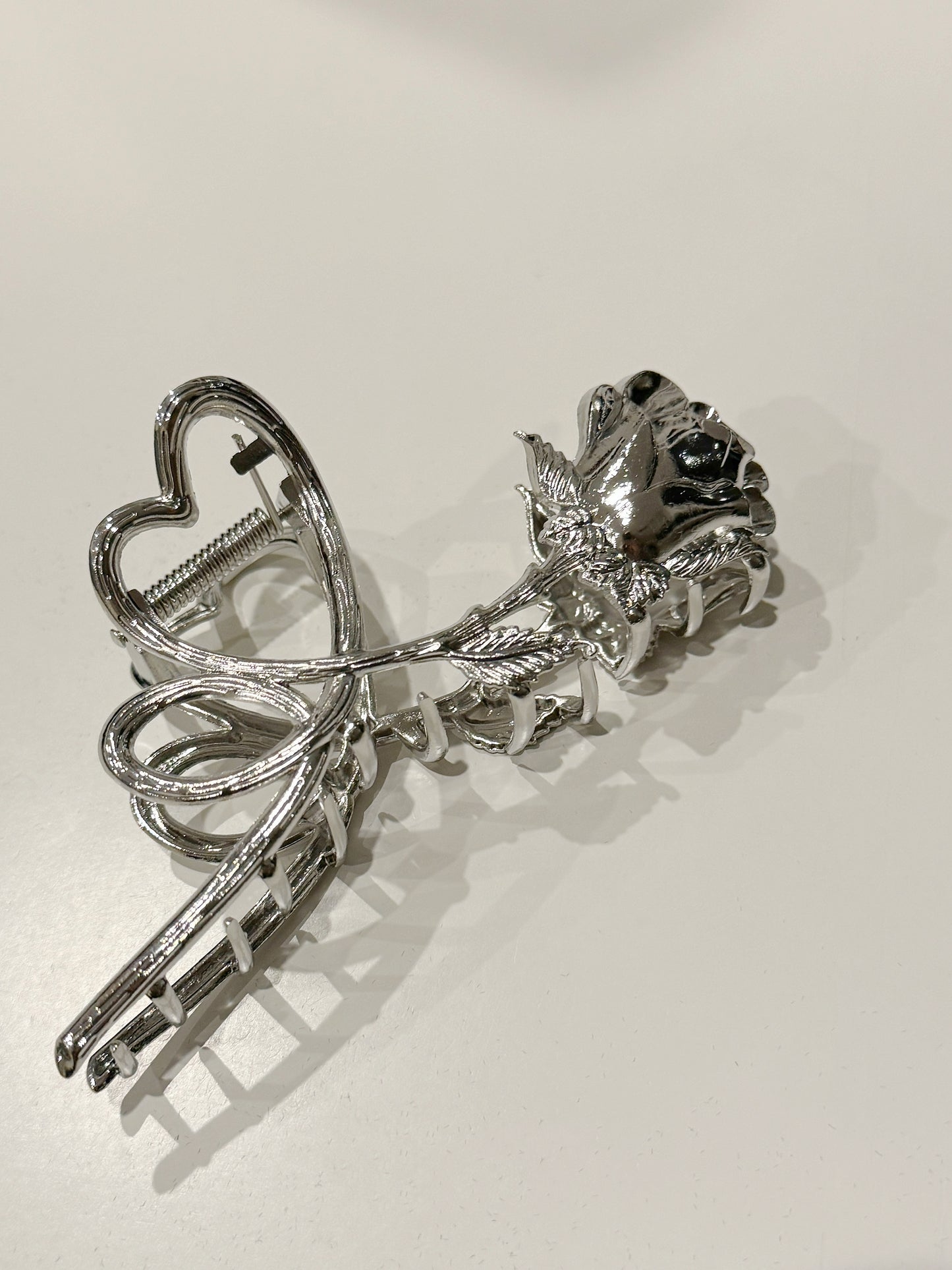 Silver Metal Heart and Rose Hair Claw Clip. silver-tone clip-on earrings for women.