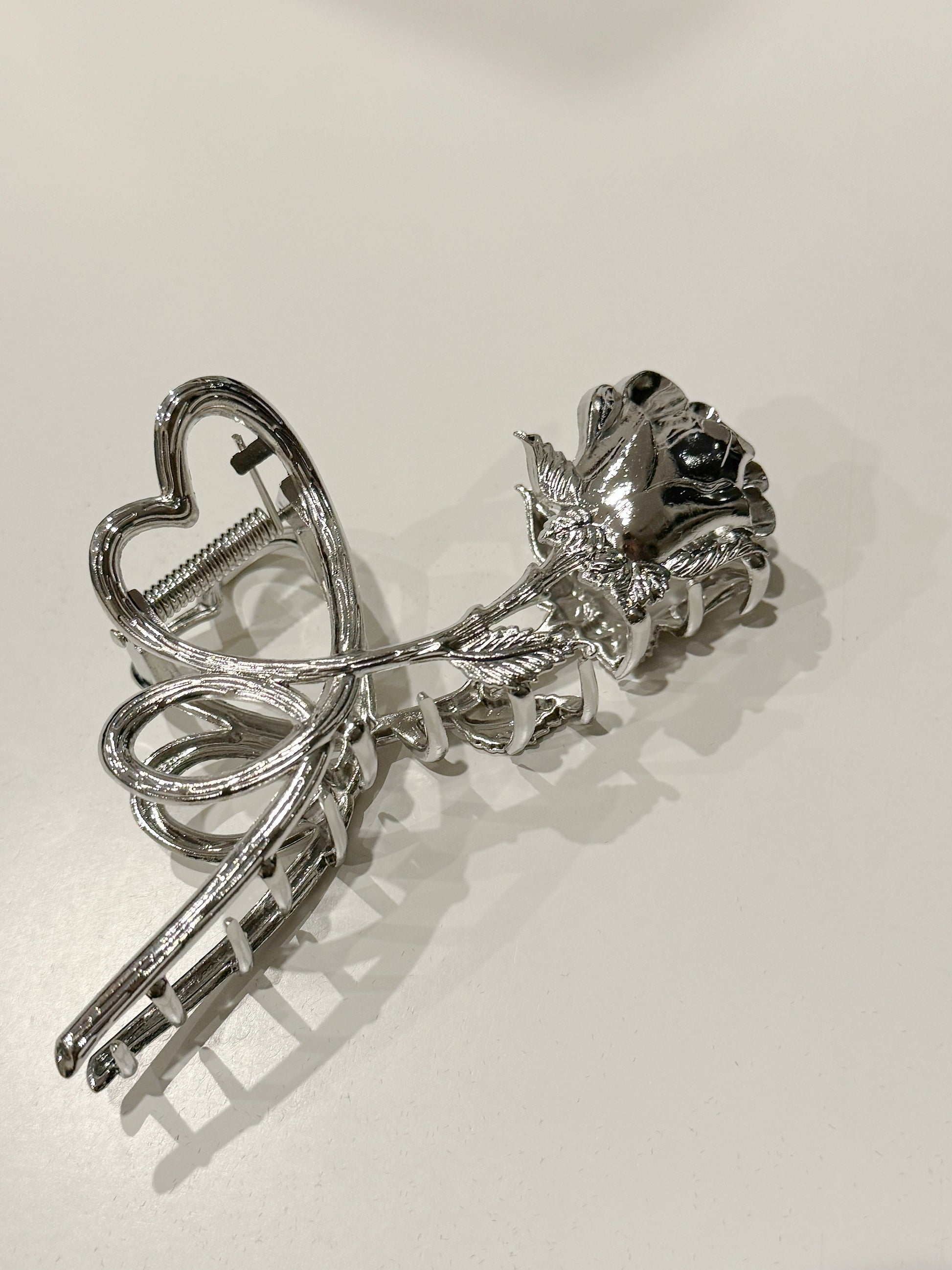 Silver Metal Heart and Rose Hair Claw Clip. silver-tone clip-on earrings for women.