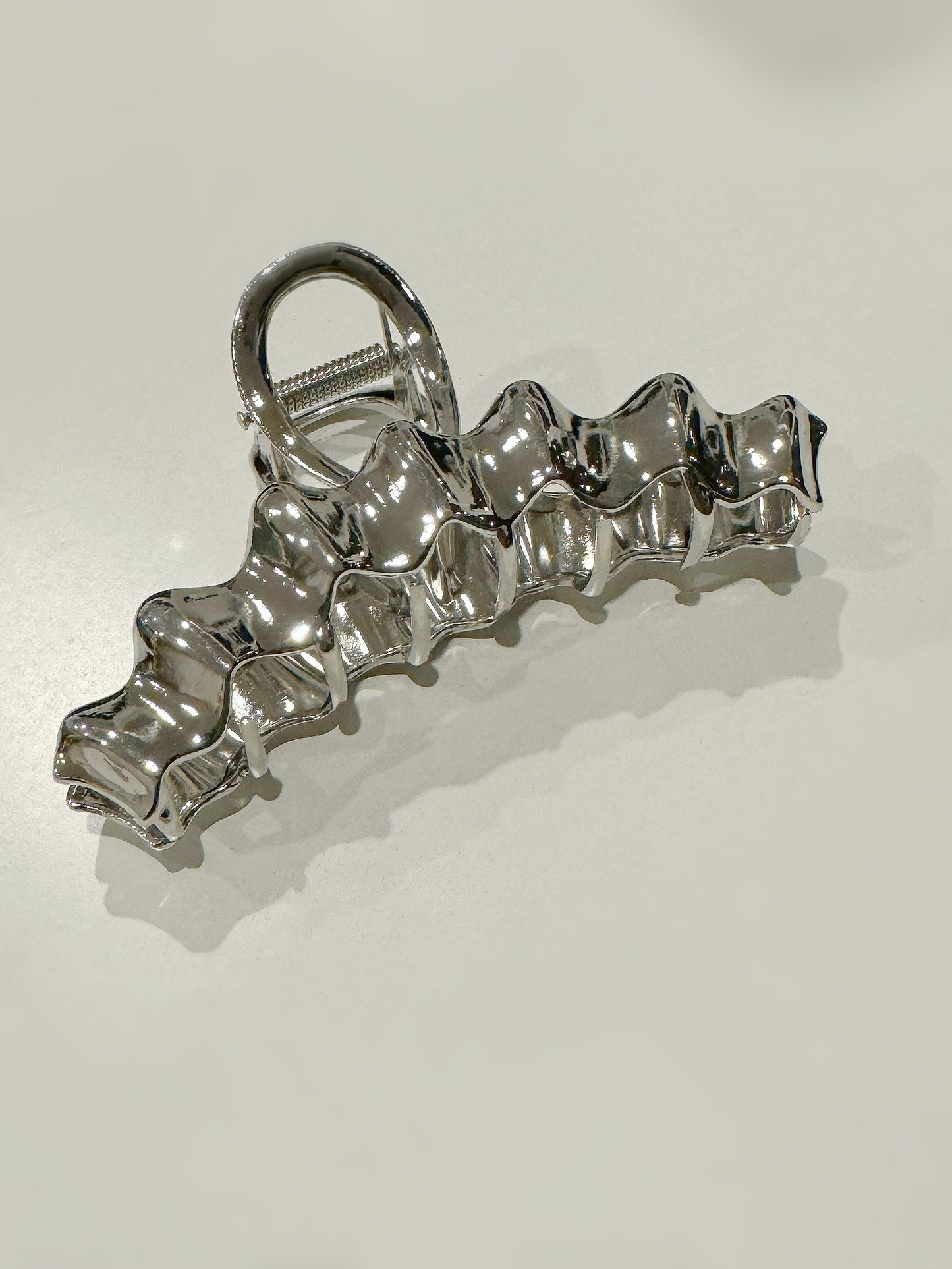 Silver Corrugated Metal Hair Claw Clip. silver-tone clip-on earrings for women.