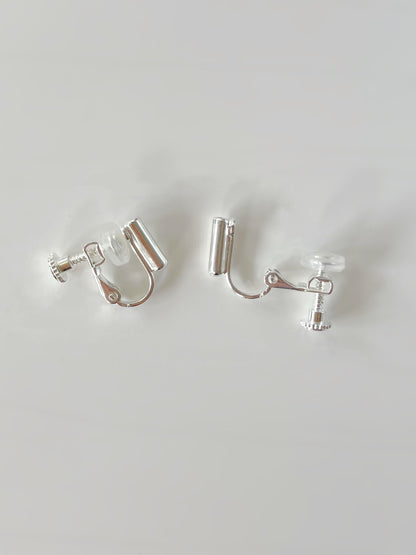 Silver Clip On With Silicon Earrings Converters. silver-tone clip-on earrings for women.