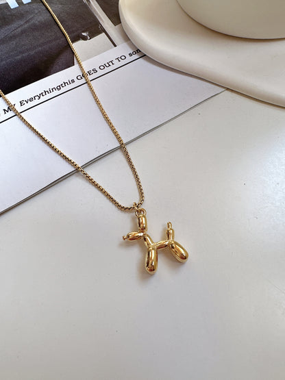 Titanium Steel Golden Balloon Dog Necklace. gold-tone clip-on earrings for women.