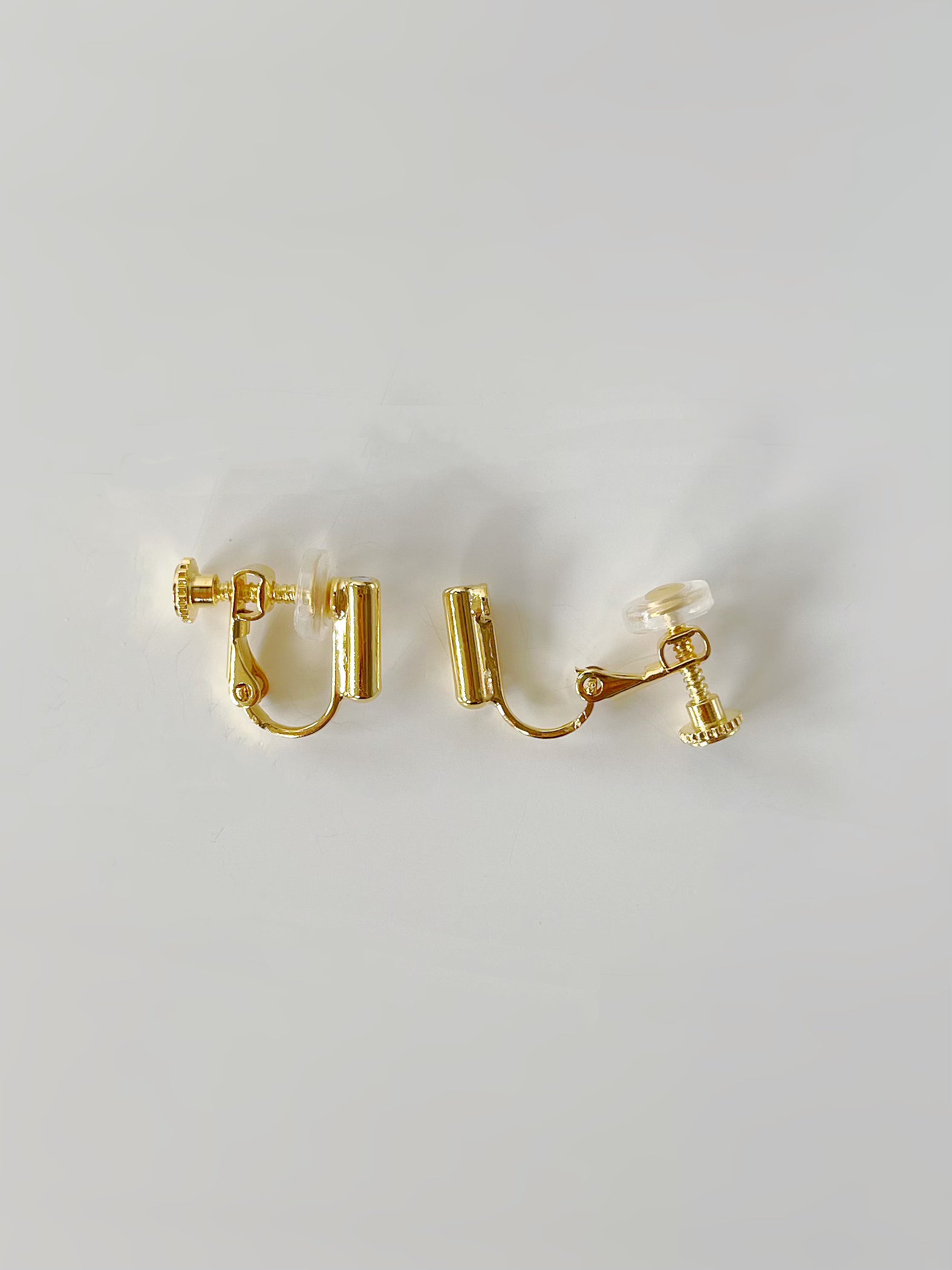 Gold Clip On With Silicon Earrings Converters. gold-tone clip-on earrings for women.