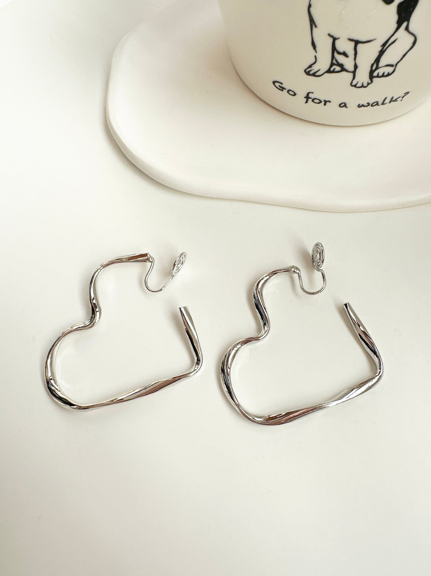 Silver Large Open Heart Hoop Clip On Earrings. silver-tone clip-on earrings for women.