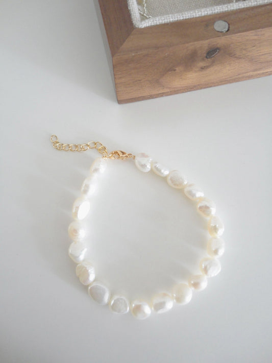 Baroque Freshwater Pearl Fob Bracelet. pearl clip-on earrings for women.