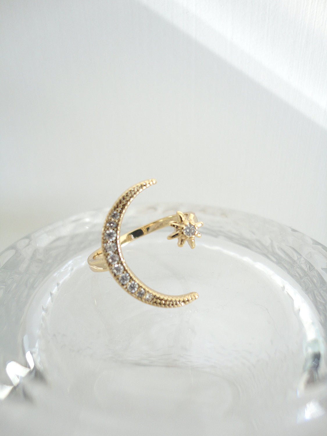 Golden Diamante Moon and Star Ring. gold-tone clip-on earrings for women.