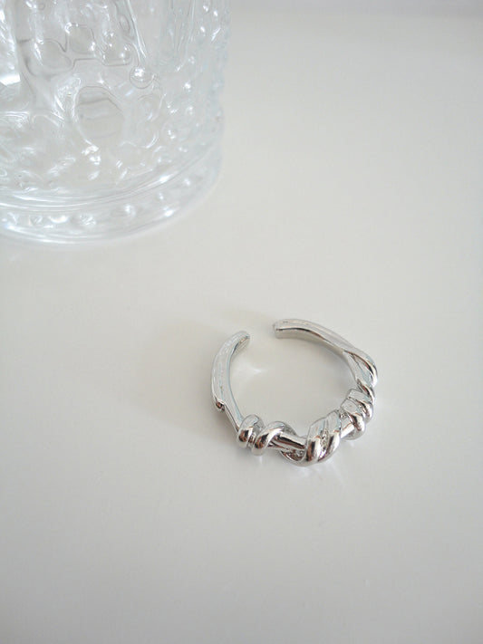 Silver Twist Textured Ring. silver-tone clip-on earrings for women.