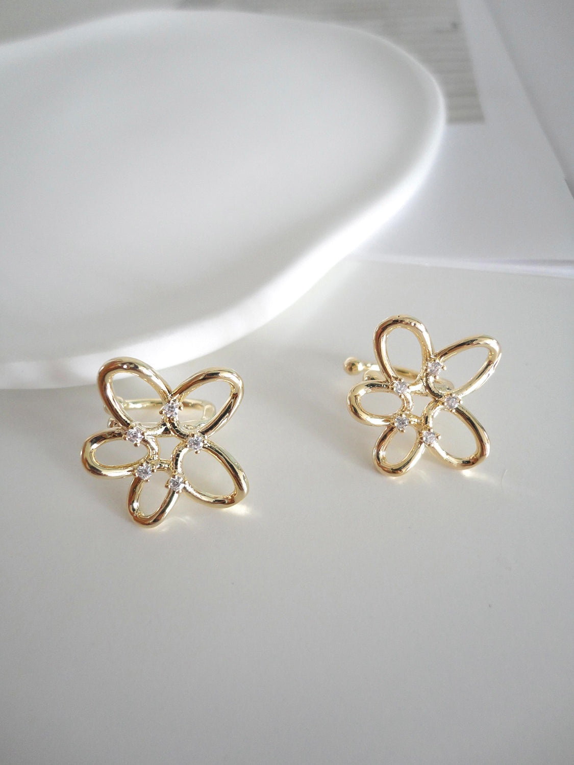 Golden Flower Zircon Ear Cuff. gold-tone clip-on earrings for women.