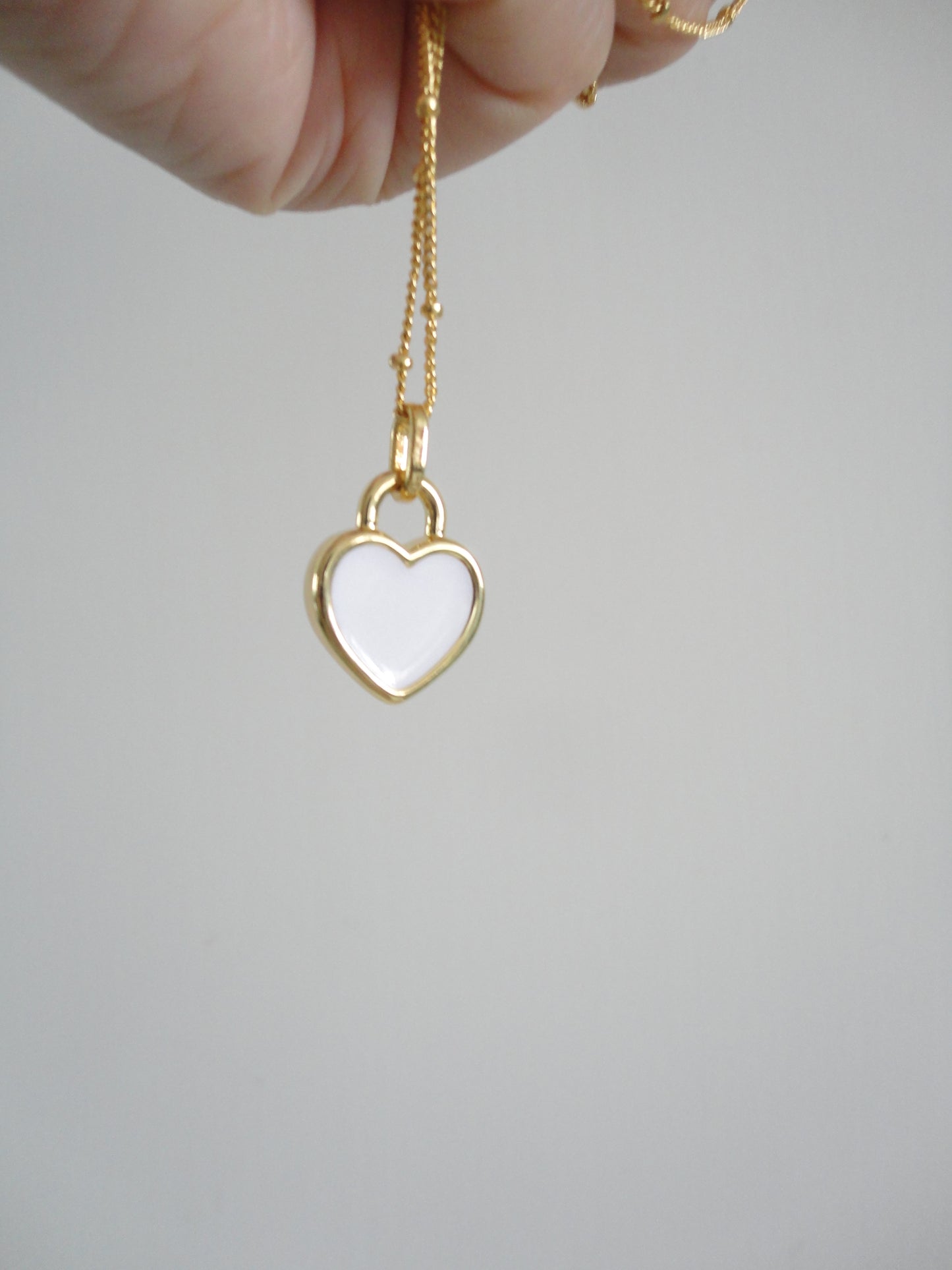 Black and White Double-Side Golden Heart Necklace