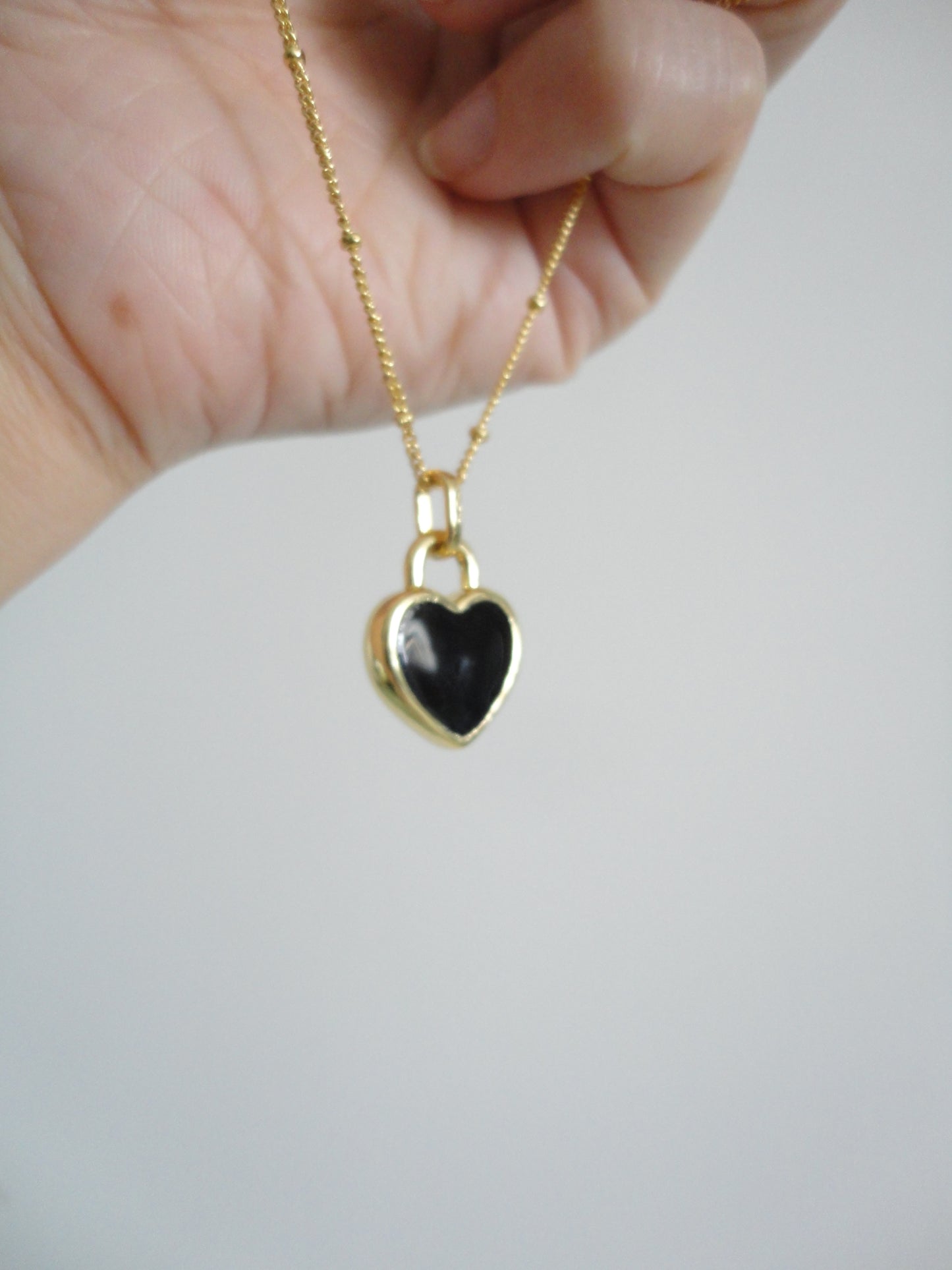 Black and White Double-Side Golden Heart Necklace