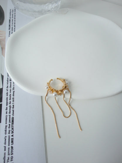 Golden Pearlised Tassel Ear Cuff. pearl, gold-tone clip-on earrings for women.