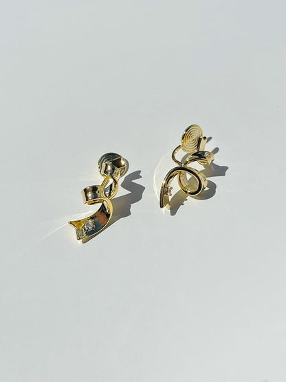 Golden Twist Ribbon Clip On Earrings. gold-tone clip-on earrings for women.