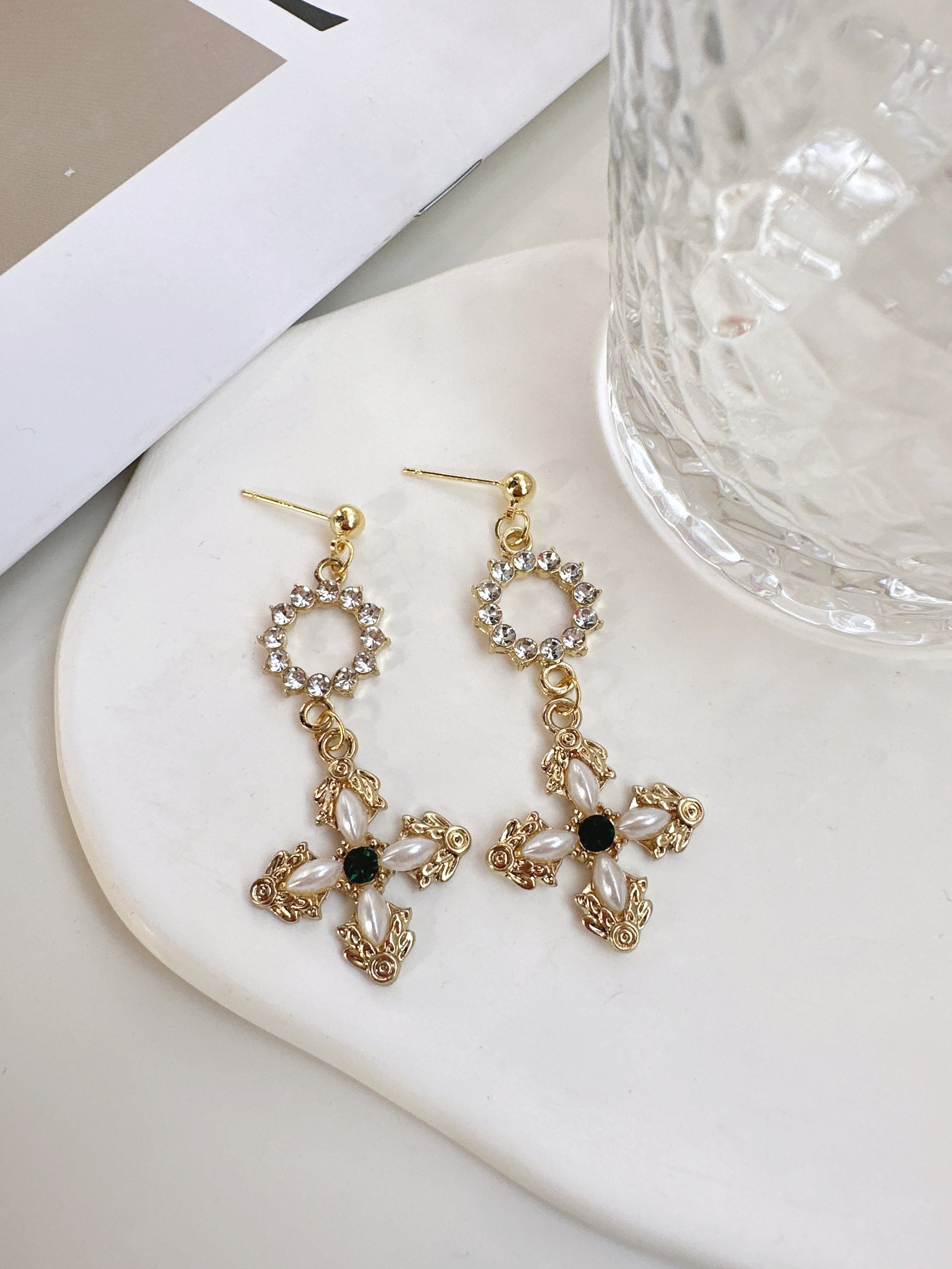 Golden Diamante Cross Drop Earrings. gold-tone clip-on earrings for women.