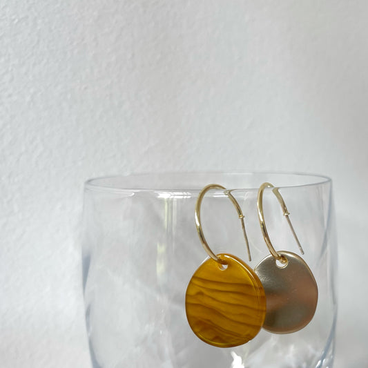 Golden Matte Disc Mismatch Drop Earrings. gold-tone clip-on earrings for women.