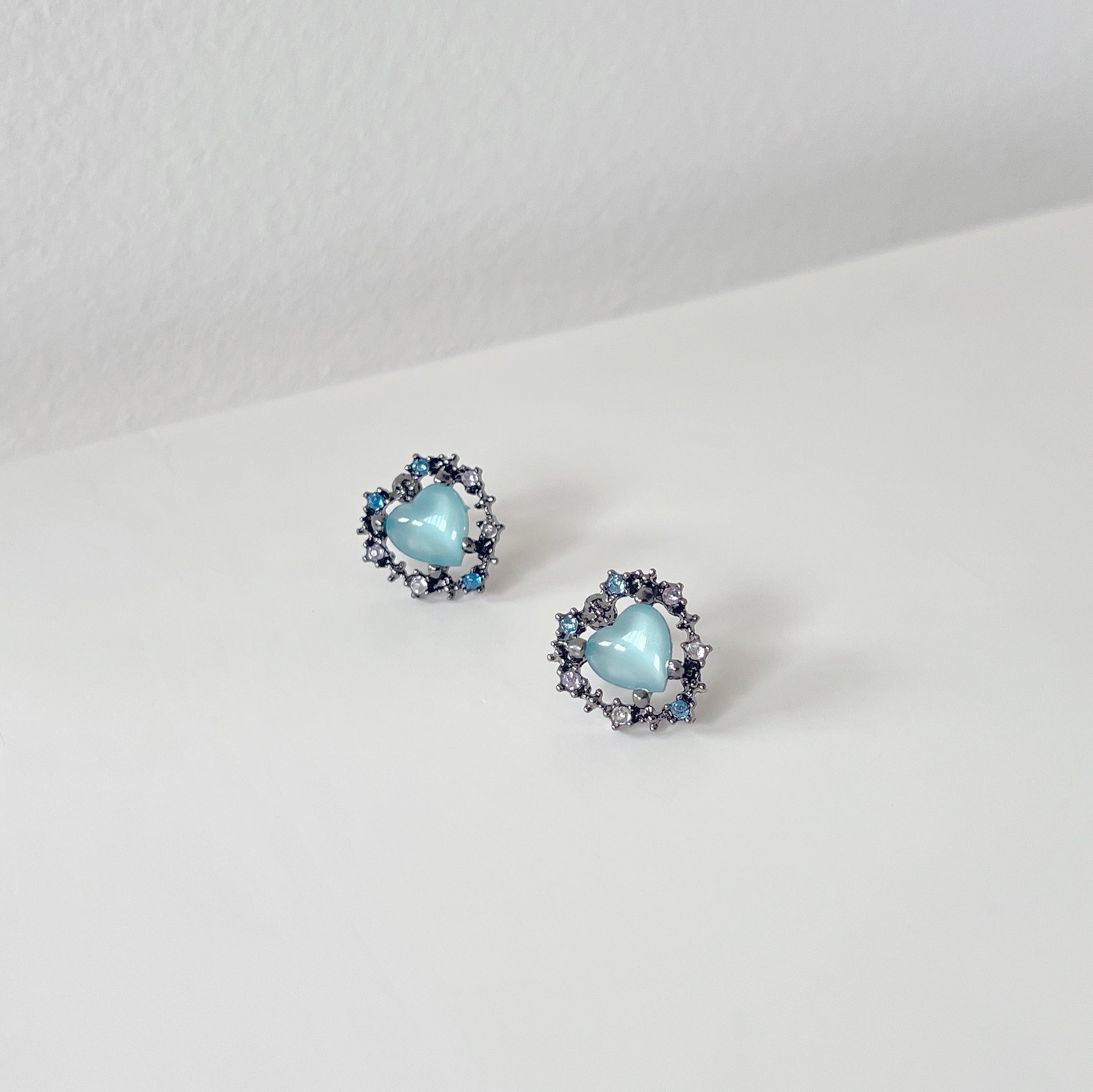 Black Crystal Blue Heart Stud Earrings. Handmade clip-on earrings for women.