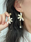 Mismatch Half Daisy Flower Clip On Earrings