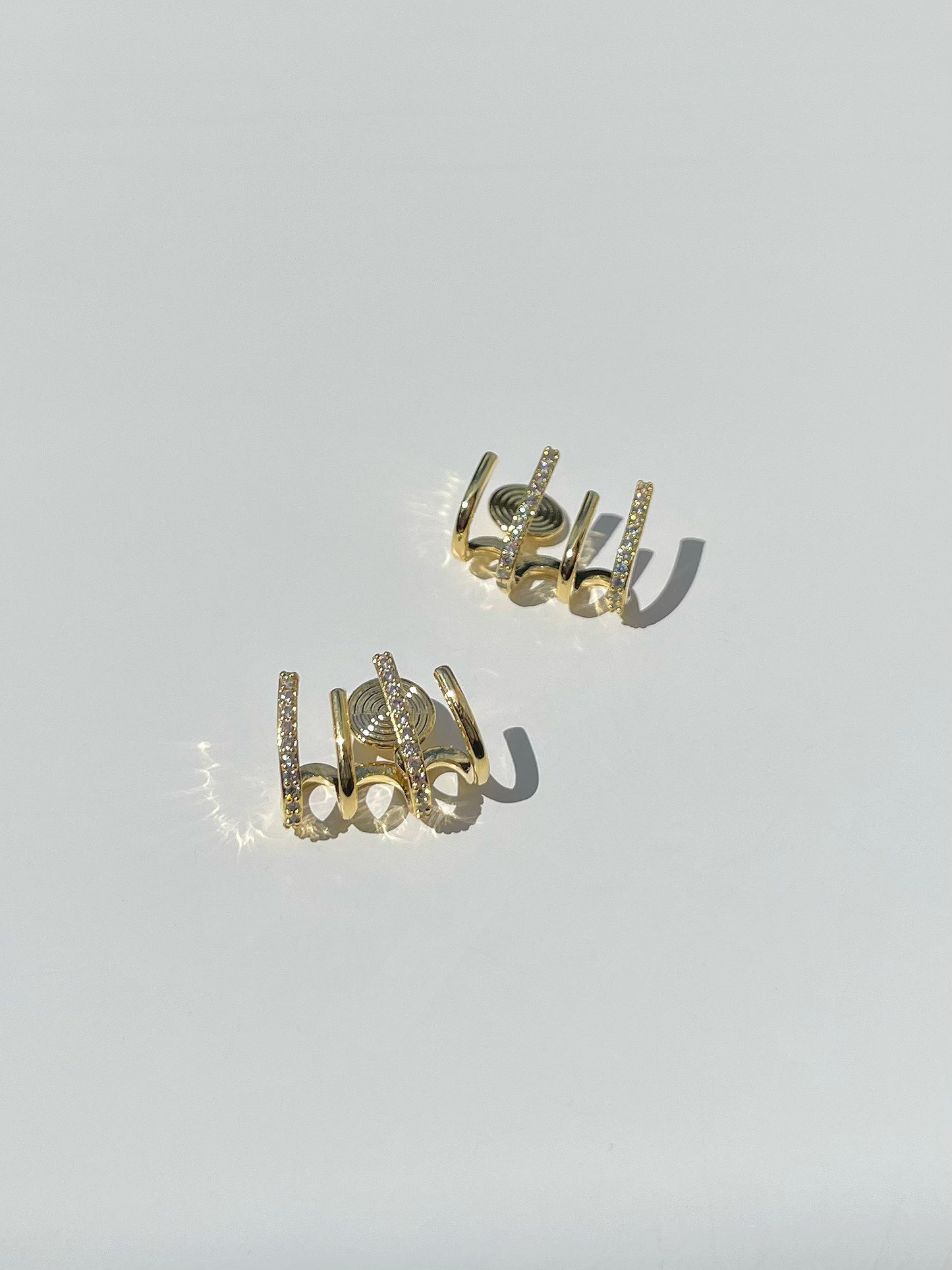 Golden Diamante Curve Clip On Earrings. gold-tone clip-on earrings for women.