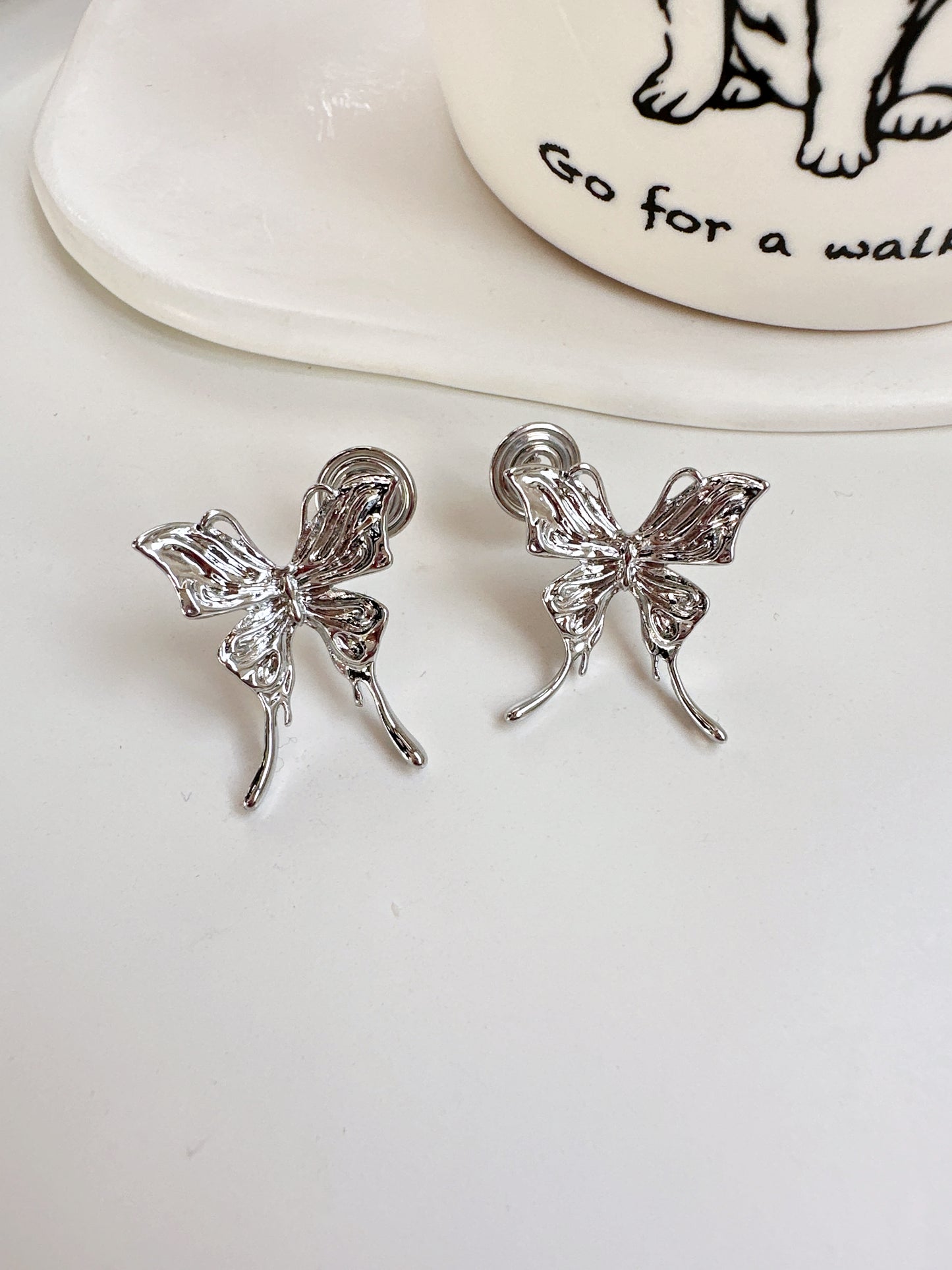 Silver Liquid Textured Butterfly Clip On Earrings