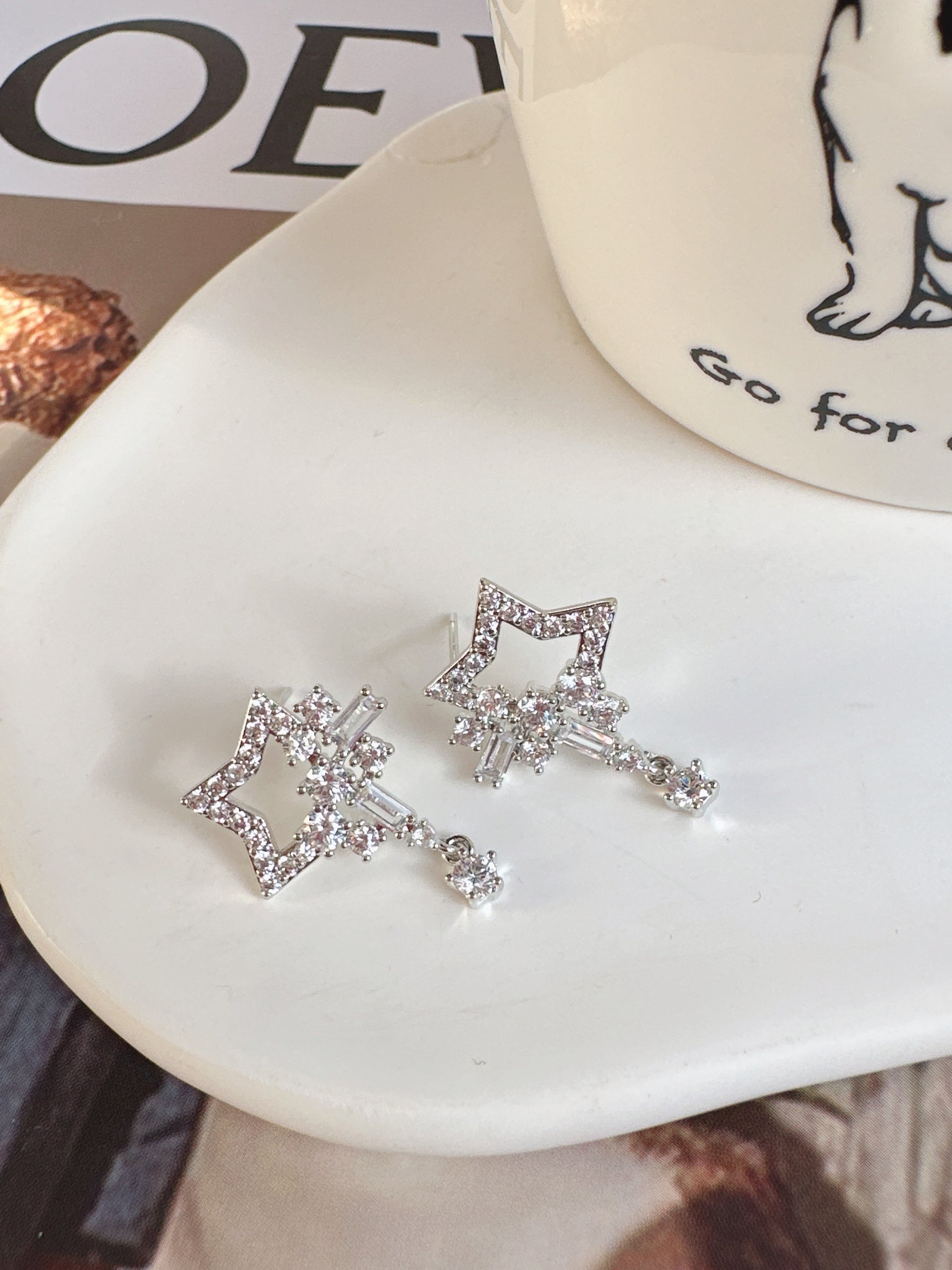 Silver Diamante Open Star Stud Earrings. silver-tone clip-on earrings for women.